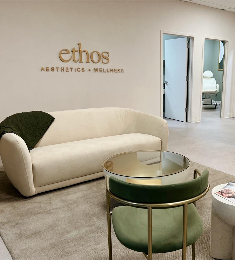 Holmdel Ethos waiting area with sofa and green chair